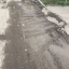 «Вдавлены люки, повреждены тротуары»: ростовчане рассказали, как стройка разрушает единственную дорогу к их домам 0